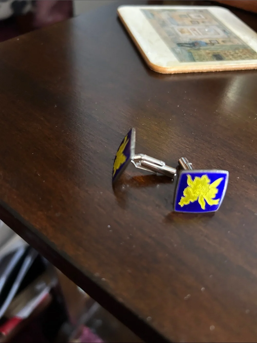 Silver.  Square Blue Enamel Cufflinks with Yellow Floral Emblem